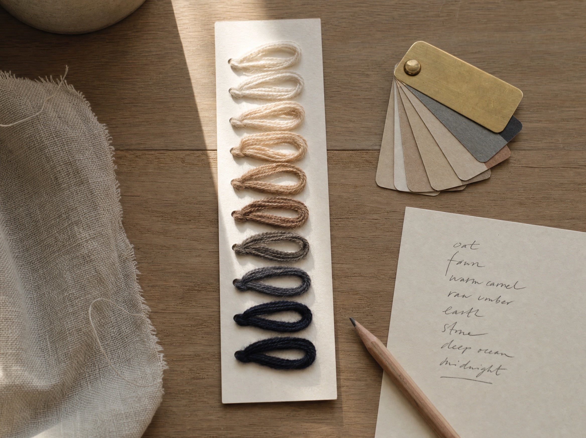 Lab dip card with dyed cashmere yarn loops